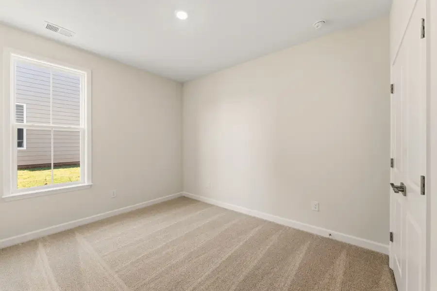 Spacious, unfurnished interior of a new home in Cottages at Lake Emory, Inman (Image 28).