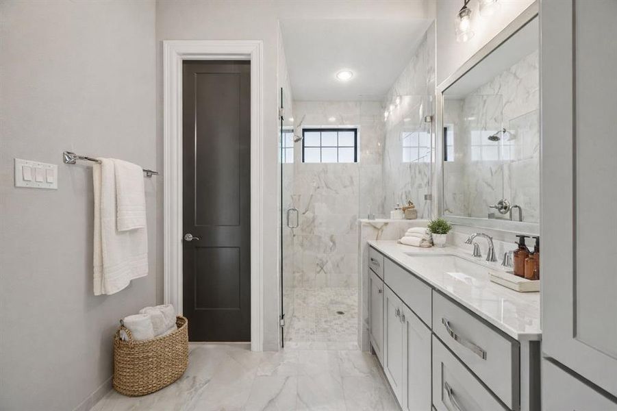 Downstairs bathroom for the second primary suite.