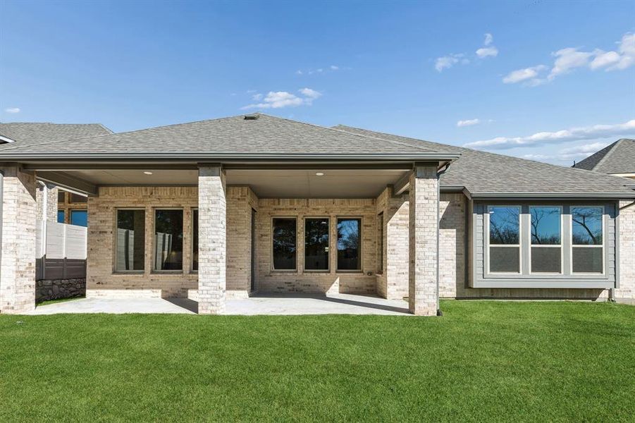 Exterior details and patio area of a home in Painted Tree Lakeside, McKinney (Image 24).