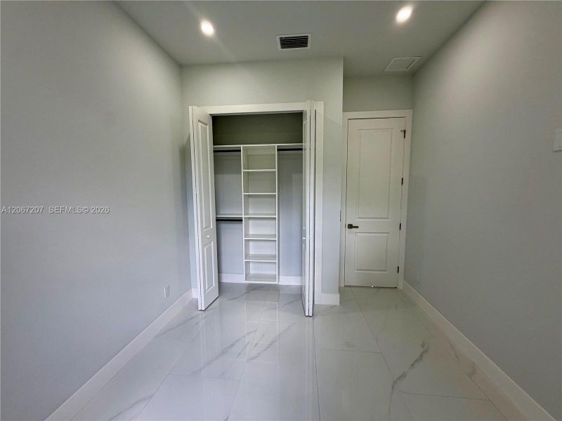 Spacious, unfurnished interior of a new home in , Lehigh Acres (Image 32). Spacious, unfurnished interior of a new home in , Lehigh Acres (Image 32).