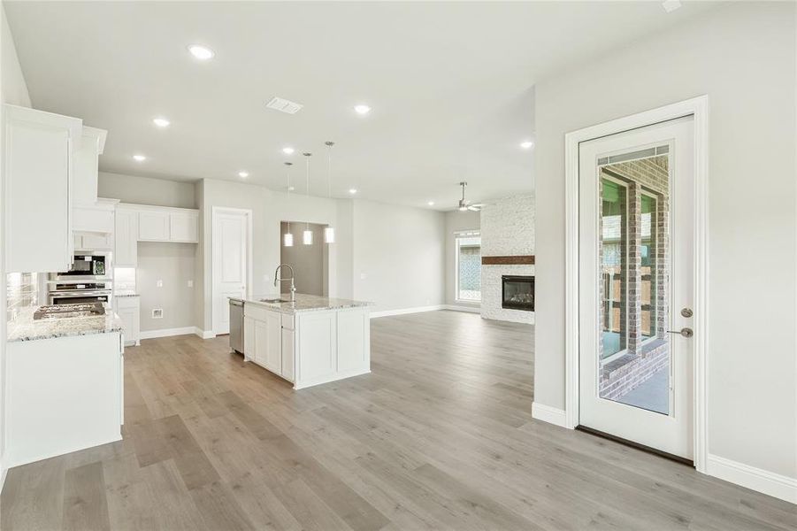 Furnished interior view inside a new home in Chaparral Park, Oak Point (Image 6).