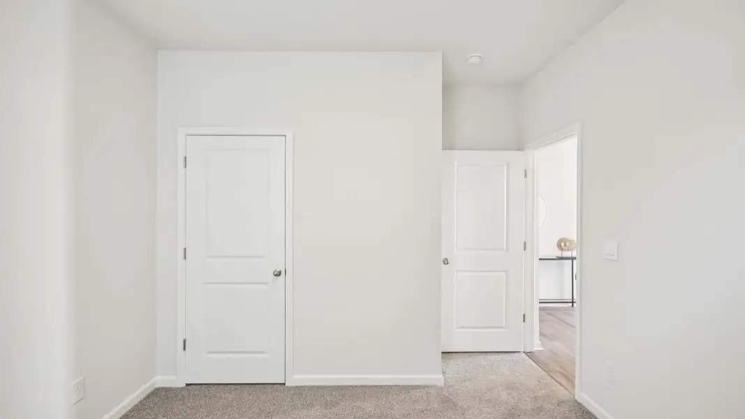 Representative unfurnished interior of a home built from the Cali by D.R. Horton in Sweetwater Village, Rockwell (Image 23).