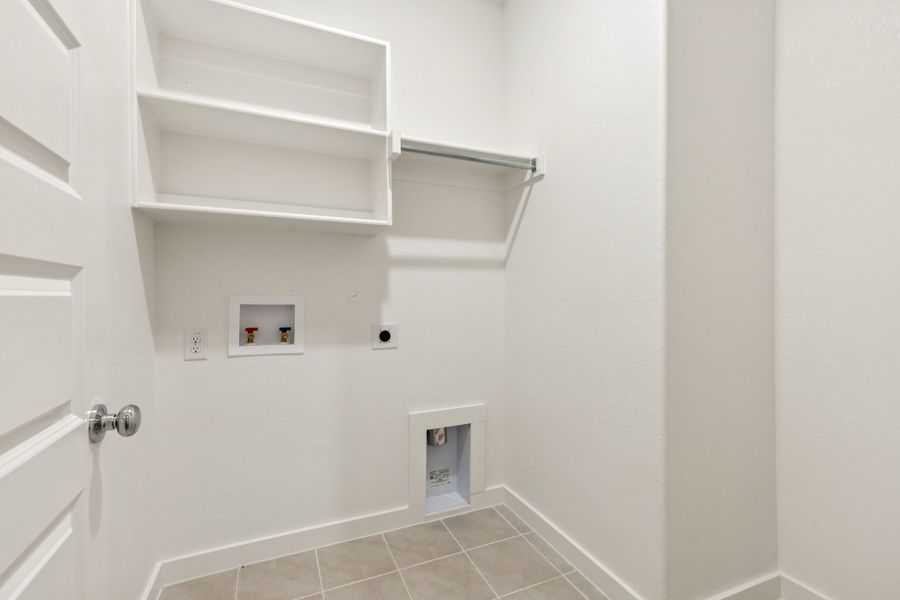 Utility Room in the Emmy II home plan by Trophy Signature Homes - REPRESENTATIVE PHOTO Utility Room in the Emmy II home plan by Trophy Signature Homes - REPRESENTATIVE PHOTO