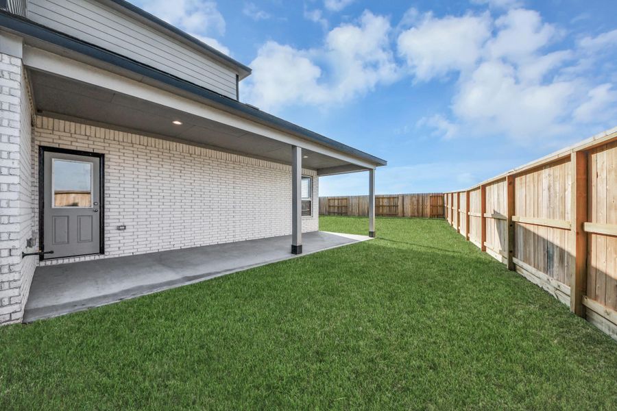 Experience outdoor living at its finest on this expansive covered patio, thoughtfully designed for BBQs and delightful outdoor dining. Experience outdoor living at its finest on this expansive covered patio, thoughtfully designed for BBQs and delightful outdoor dining.