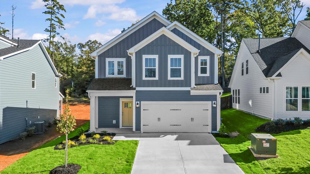 Representative exterior photo of a completed home built from the Mint by DRB Homes in Pleasant Falls, Moore, SC (Image 27).