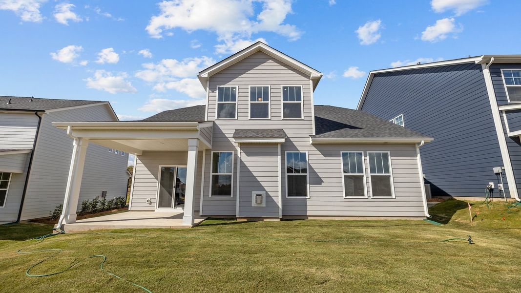 Fairfield design rear elevation with covered rear porch at Lakeside Glen by premier builder DRB Homes, York, SC.