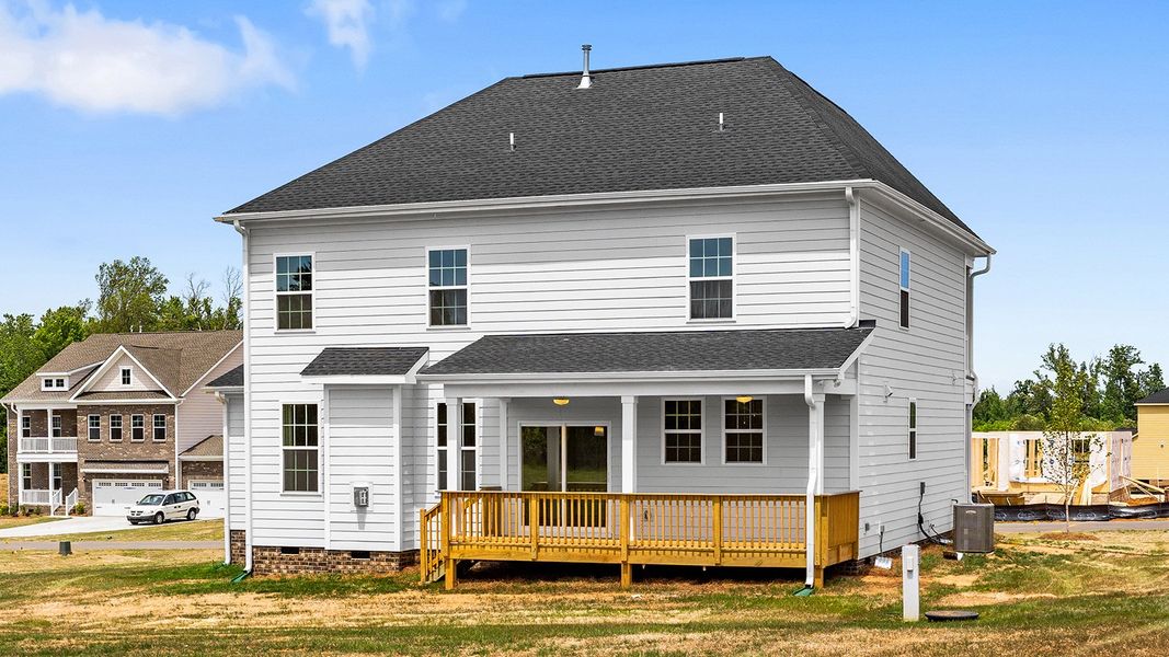 Exterior details and patio area of a home in Lilah Grove, Summerfield (Image 27).