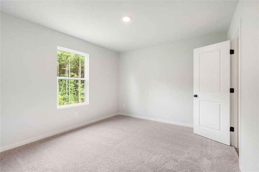 Spacious, unfurnished interior of a new home in Windsong Estates, McDonough (Image 16).