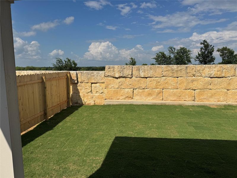 Exterior details and patio area of a home in Hunters Glen, Jarrell (Image 16).