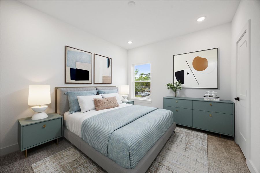 This secondary bedroom combines comfort and style, featuring plush carpeting, neutral paint, recessed lighting, a large window, and a spacious closet. This secondary bedroom combines comfort and style, featuring plush carpeting, neutral paint, recessed lighting, a large window, and a spacious closet.