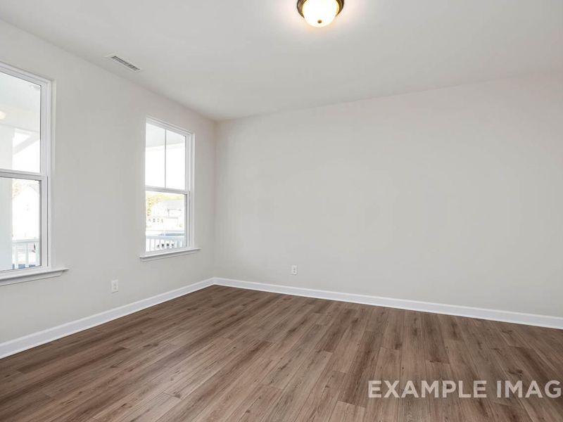 Spacious, unfurnished interior of a new home in Retreat at North Main, Lillington (Image 9).