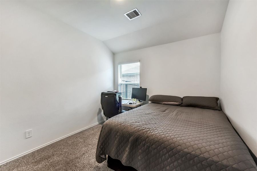 Furnished interior view inside a new home in Sunterra, Katy (Image 10).