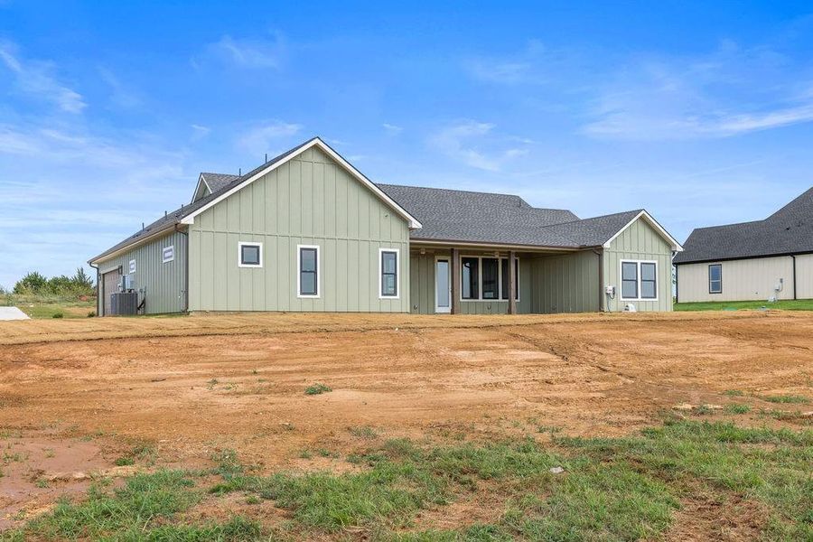 Front exterior of a new home in , Whitesboro, TX, highlighting curb appeal (Image 20).
