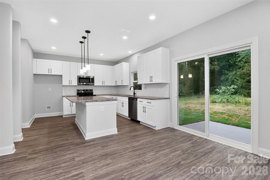 Furnished interior view inside a new home in , Belmont (Image 9).