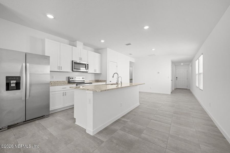 Furnished interior view inside a new home in Lakes at Bella Lago – Classic Series, Green Cove Springs (Image 8).