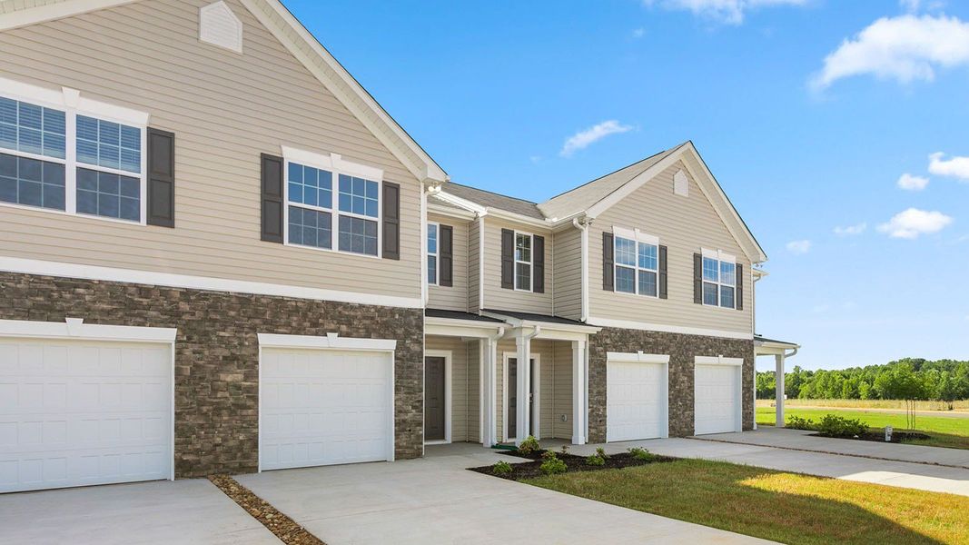 Front exterior of a new home in Henley Ridge, Graham, NC, highlighting curb appeal (Image 2).