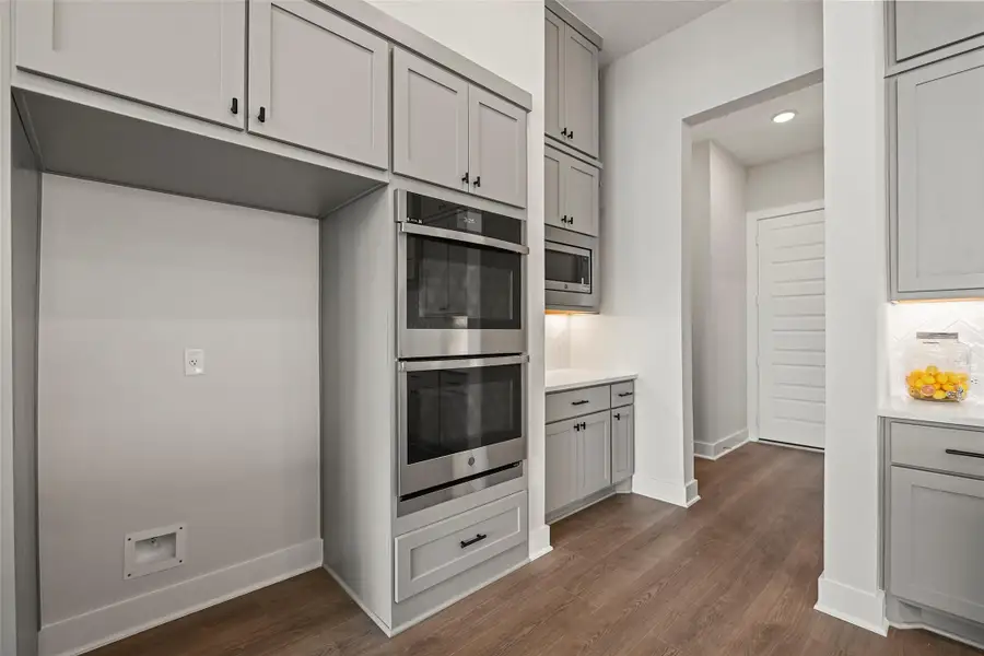 Furnished interior view inside a new home in Bridgeland 70′, Cypress (Image 14).