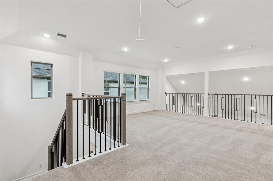 Game Room in the Picasso II home plan by Trophy Signature Homes – REPRESENTATIVE PHOTO