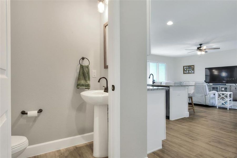 Half Bath, off of Kitchen, and laundry room.