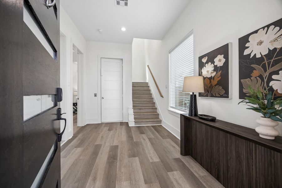 Welcome home! The front foyer is warm and inviting. Welcome home! The front foyer is warm and inviting.