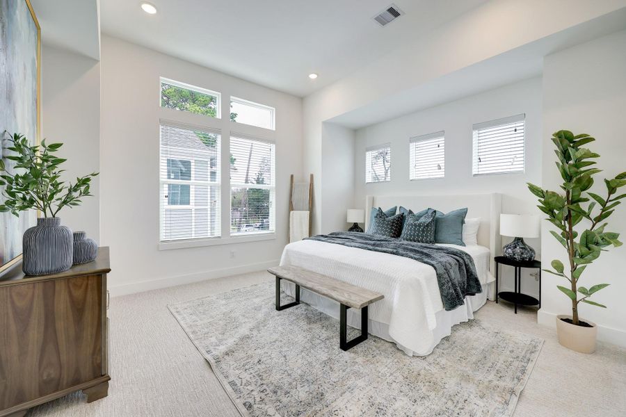 Serene Master Suite: Bathed in natural light with ample space for relaxation. Serene Master Suite: Bathed in natural light with ample space for relaxation.