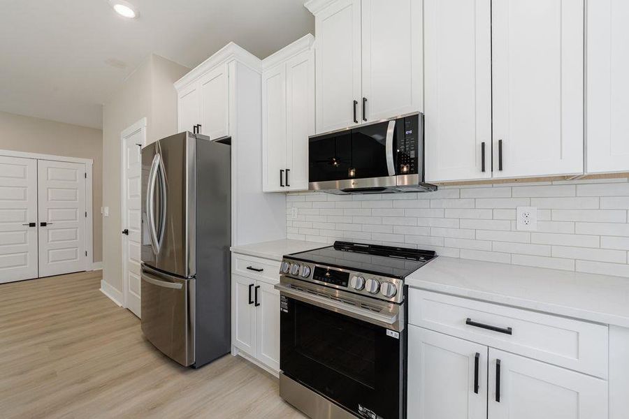 Furnished interior view inside a new home in , Carrollton (Image 13).