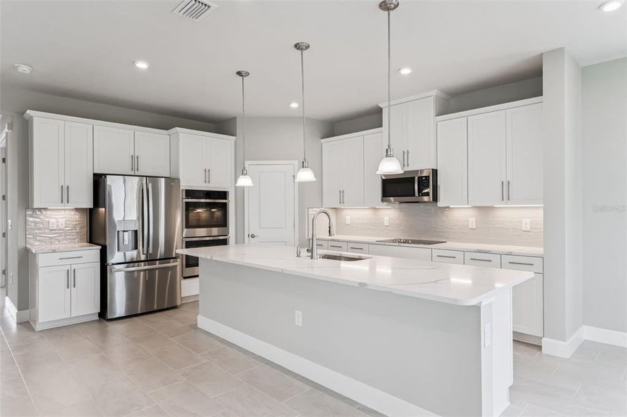 Furnished interior view inside a new home in Bella Terra, Clermont (Image 27). Furnished interior view inside a new home in Bella Terra, Clermont (Image 27).