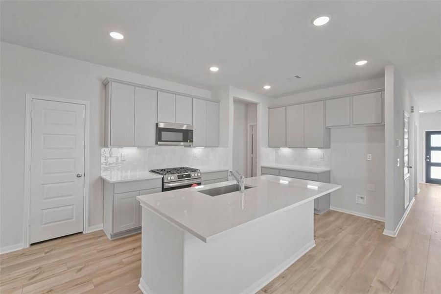 Furnished interior view inside a new home in Lakes at Black Oak, Magnolia (Image 34).
