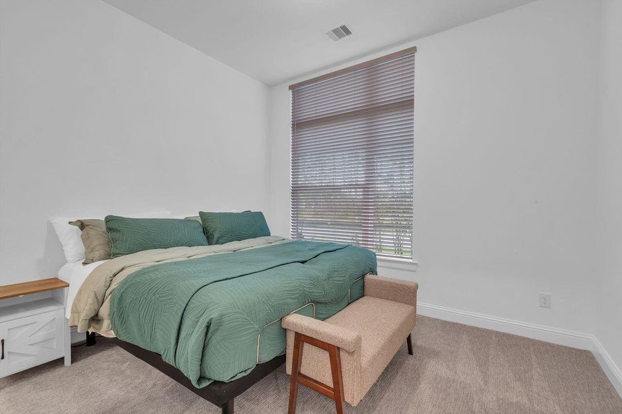 Furnished interior view inside a new home in The Highlands - 65', Porter (Image 36). Furnished interior view inside a new home in The Highlands - 65', Porter (Image 36).