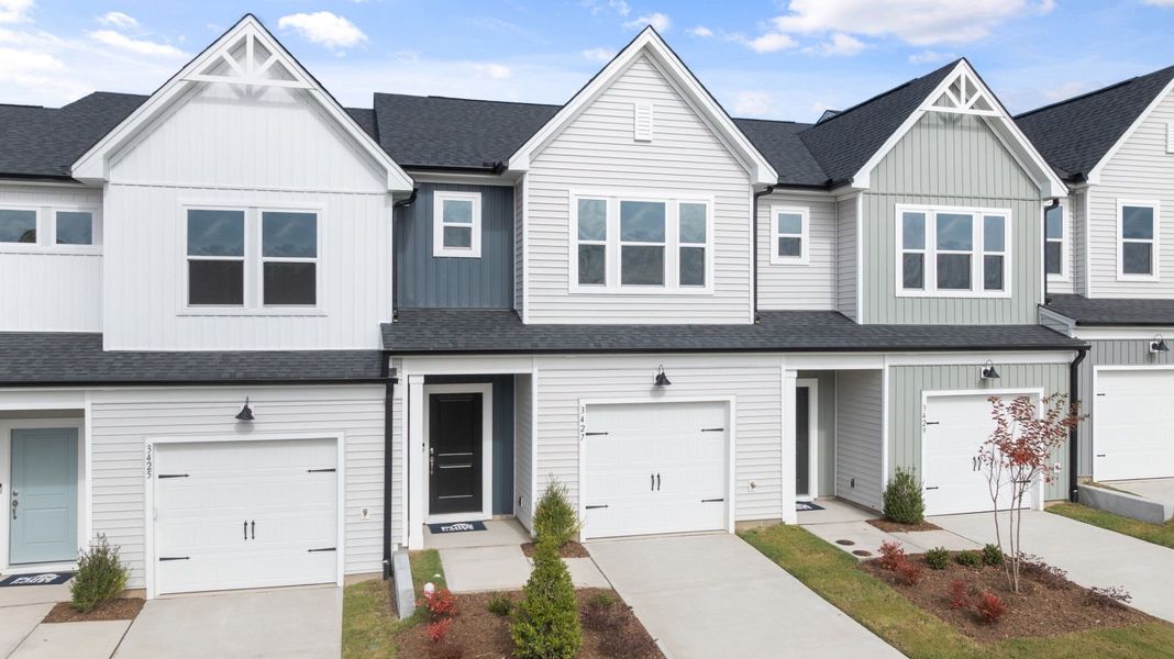 Front exterior of a new home in McConnell Ridge, McLeansville, NC, highlighting curb appeal (Image 16).