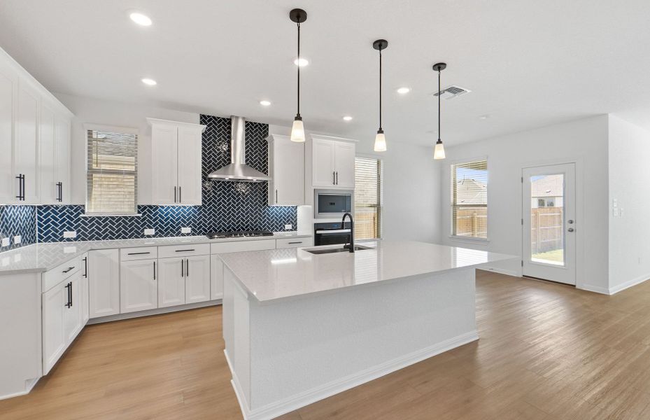 Furnished interior view inside a new home in Saddleback at Santa Rita Ranch, Liberty Hill (Image 5). Furnished interior view inside a new home in Saddleback at Santa Rita Ranch, Liberty Hill (Image 5).