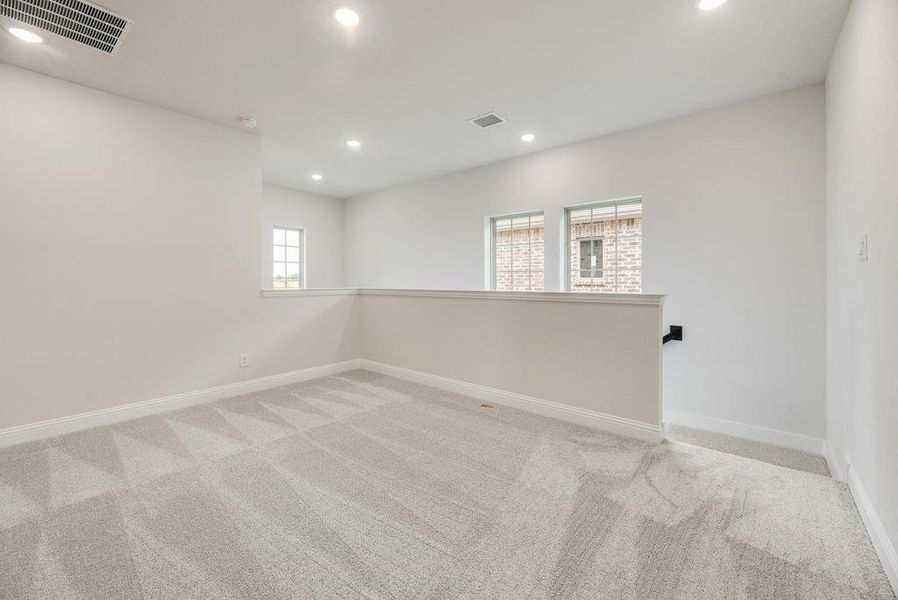 Spacious, unfurnished interior of a new home in Spiritas Ranch, Little Elm (Image 28).