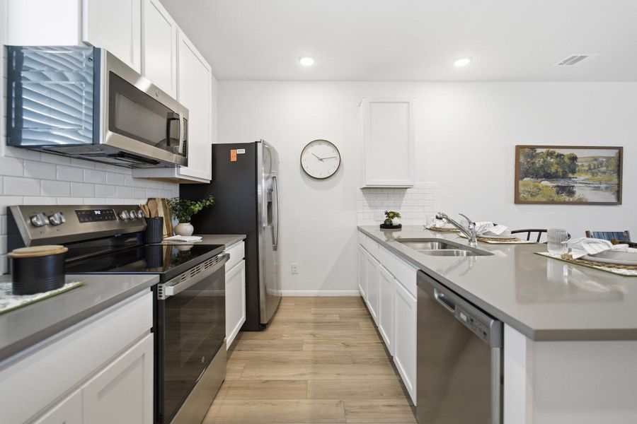 Furnished interior view inside a new home in Municipal Drive Townhomes, Leander (Image 11).