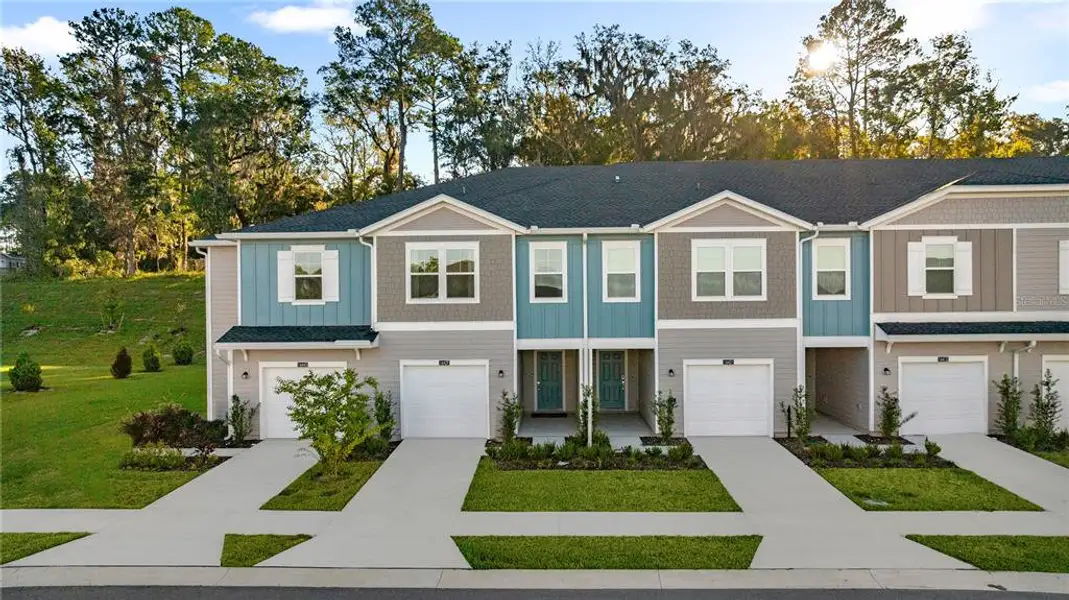 Front exterior of a new home in , Alachua, FL, highlighting curb appeal (Image 2). Front exterior of a new home in , Alachua, FL, highlighting curb appeal (Image 2).