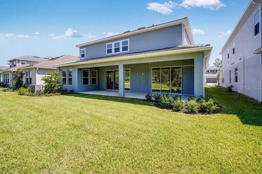 Exterior details and patio area of a home in Hammock at Two Rivers, Zephyrhills (Image 3).