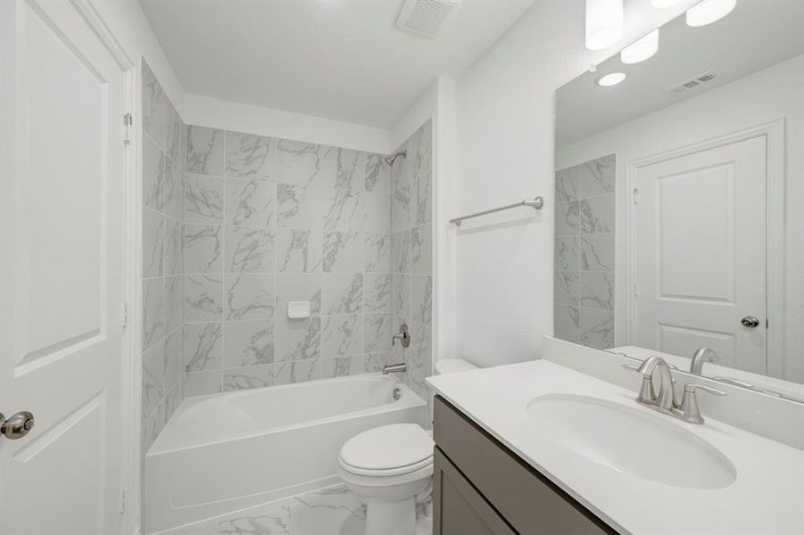 Furnished interior view inside a new home in Lily Creek at Sutton Fields, Aubrey (Image 18).