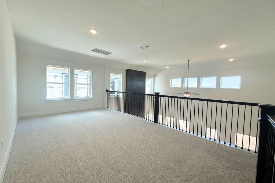 Spacious, unfurnished interior of a new home in The Grove at Blackhawk, Pflugerville (Image 18).