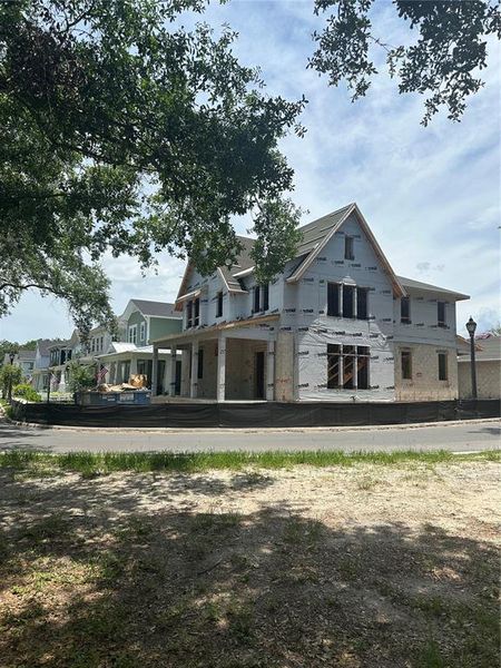 Front exterior of a new home in , Winter Garden, FL, highlighting curb appeal (Image 7).