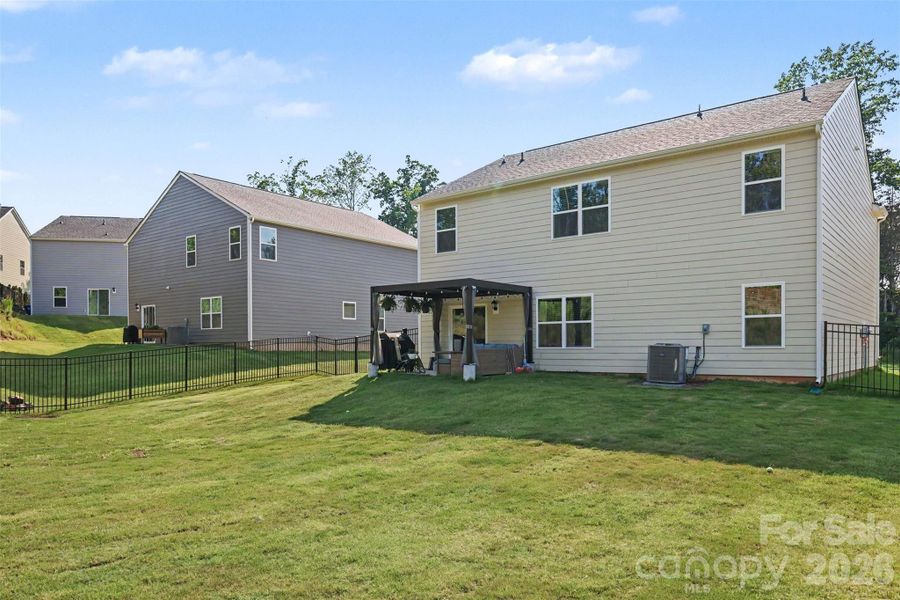 Exterior details and patio area of a home in Lakeshore at Windstone, Mooresville (Image 24).