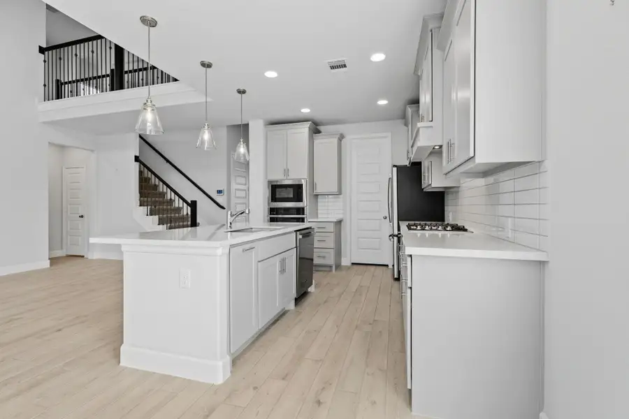 Furnished interior view inside a new home in Cane Island 50', Katy (Image 11). Furnished interior view inside a new home in Cane Island 50', Katy (Image 11).