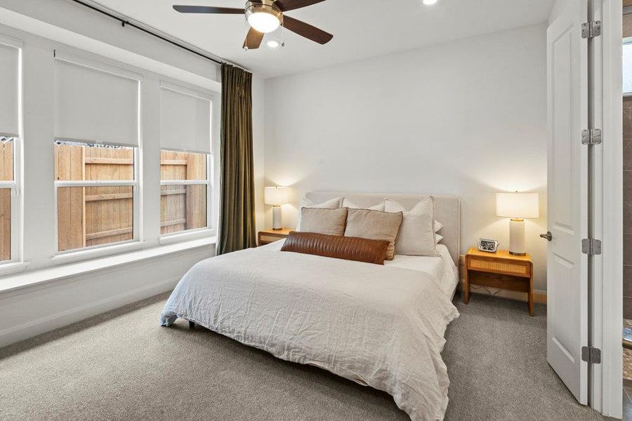 Bedroom with recessed lighting, baseboards, a ceiling fan, and carpet flooring