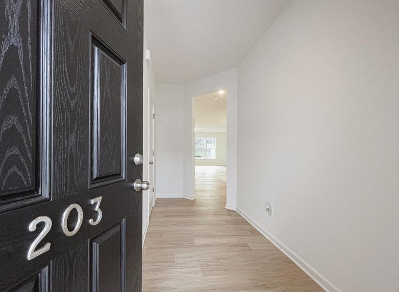 Spacious, unfurnished interior of a new home in East Main Townes, Spartanburg (Image 10).