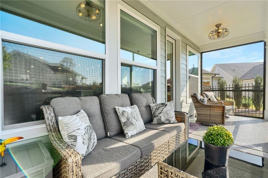 Exterior details and patio area of a home in Crescent Pointe at Great Sky, Canton (Image 29).