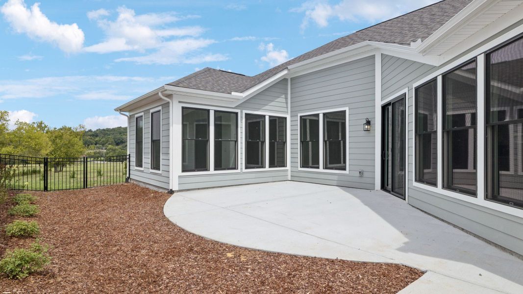 Exterior details and patio area of a home in The Courtyards at Stewarts Creek, Smyrna (Image 3).