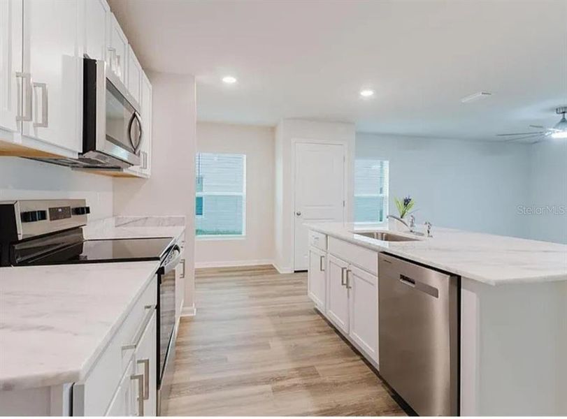 Furnished interior view inside a new home in Silverstone North, Palmetto (Image 7).