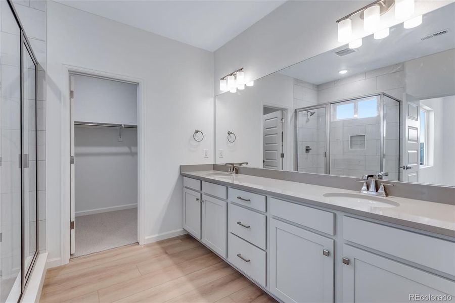 Furnished interior view inside a new home in Crescendo at The Aurora Highlands, Aurora (Image 11).