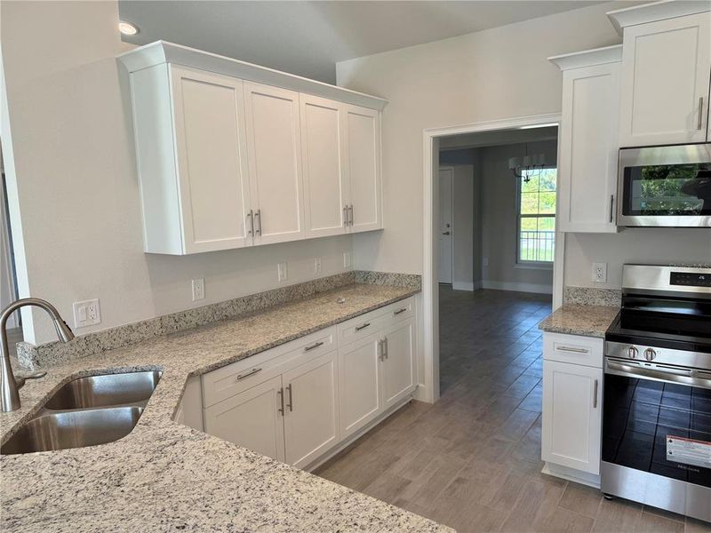 Furnished interior view inside a new home in , Port Charlotte (Image 5).