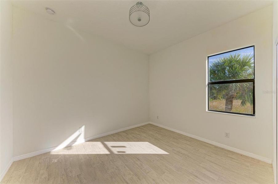 Spacious, unfurnished interior of a new home in , Port Charlotte (Image 15).