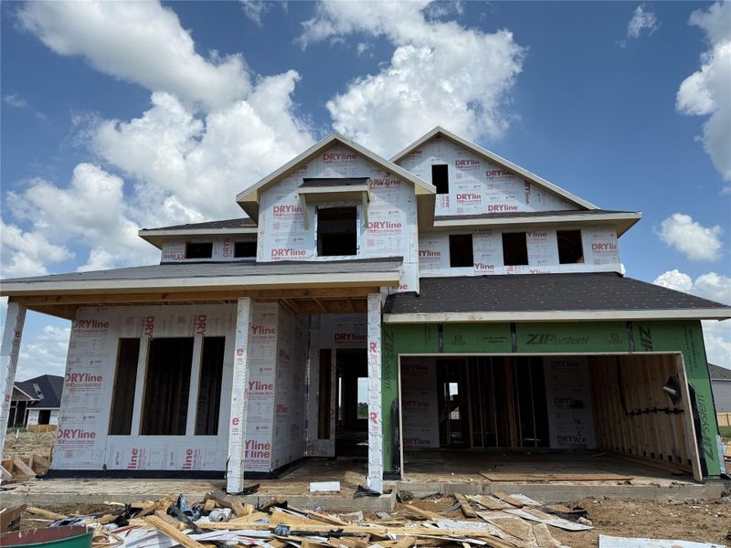 Property in mid-construction with an attached garage Property in mid-construction with an attached garage