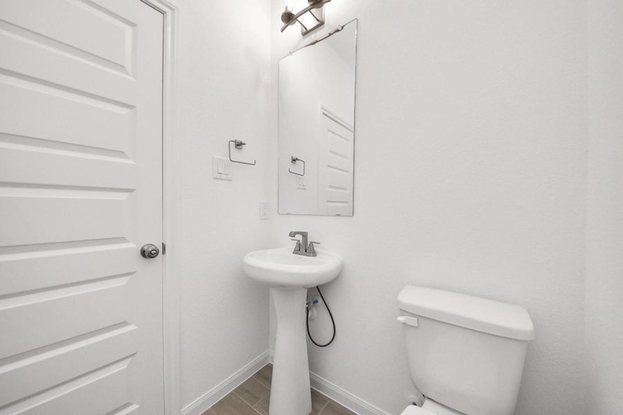 Furnished interior view inside a new home in Elyson, Katy (Image 13).